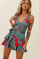 Wishful Thinking Plunging Neckline Ruffle Hem Romper Floral Print Sage